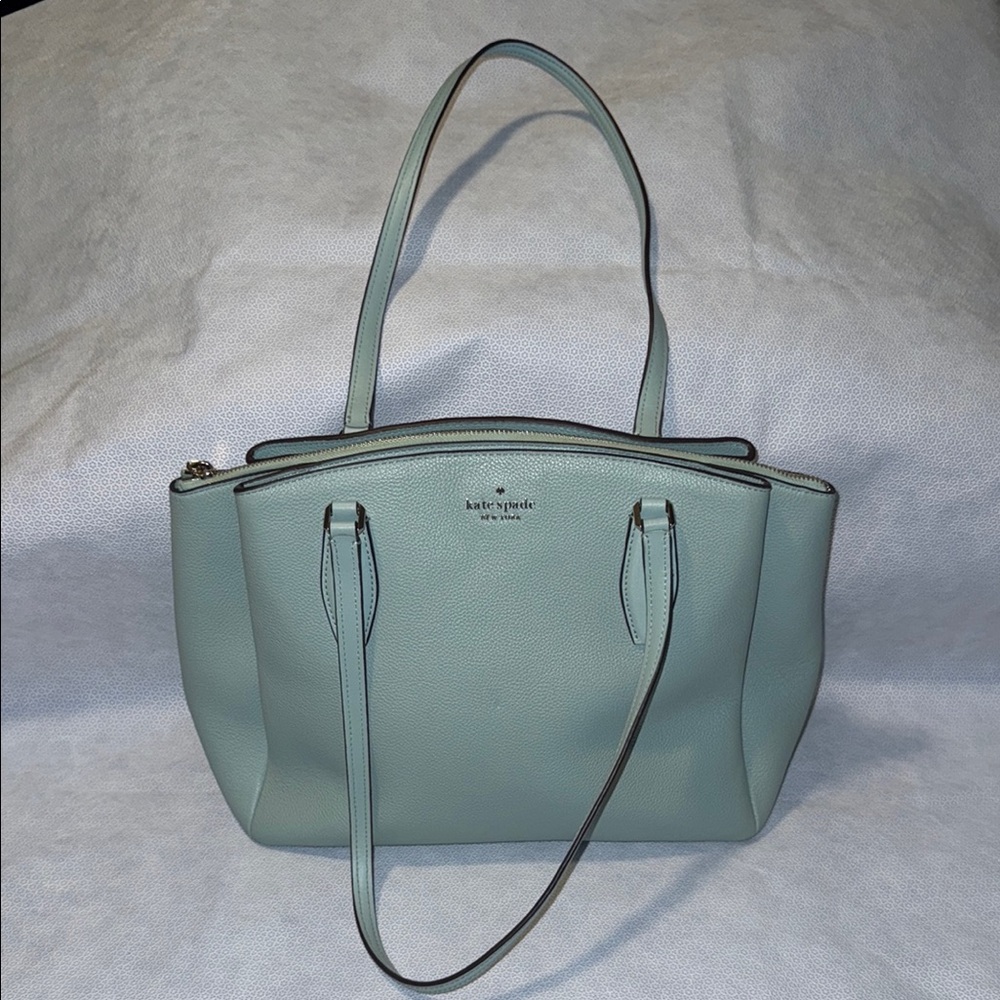 Kate Spade Monet Triple Compartment Tote in a dusty blue or cloud mist color.